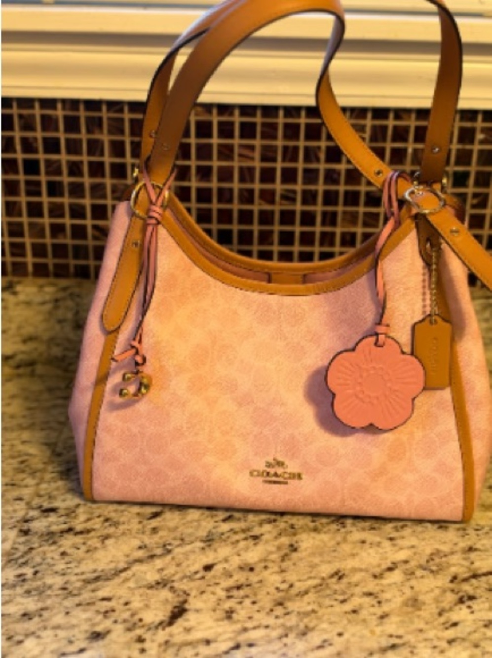 Coach Pink Signature Canvas Shoulder Bag with Tan Trim and Flower Charm